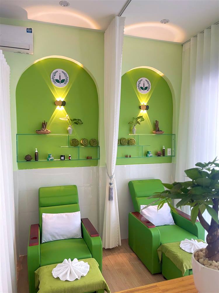 Two green foot-soak chairs